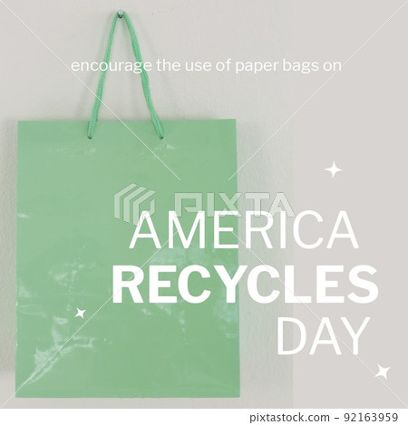 Square image of america recycles day text in white on grey, with green paper shopping bag Square image of america recycles day text in white on grey, with green paper shopping bag 92163959