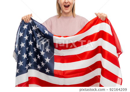 screaming woman holding flag of america screaming woman holding flag of america 92164209