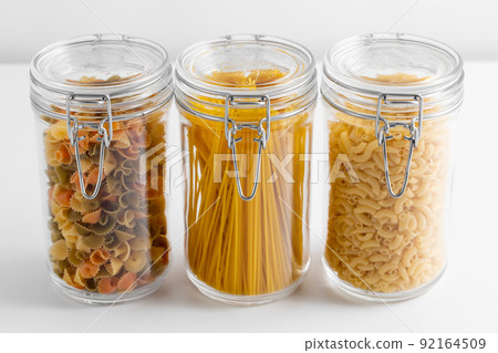 close up of jars with different pasta types close up of jars with different pasta types 92164509