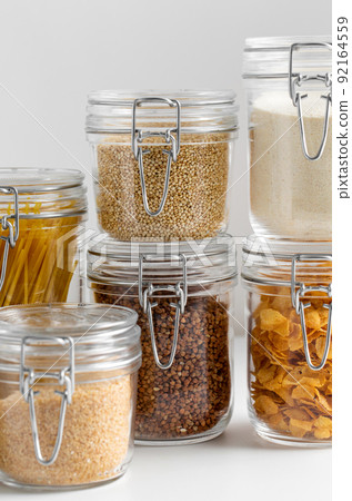 close up of jars with cereals or groceries 92164559