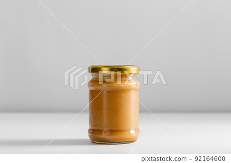 close up of jar with canned peanut butter close up of jar with canned peanut butter 92164600