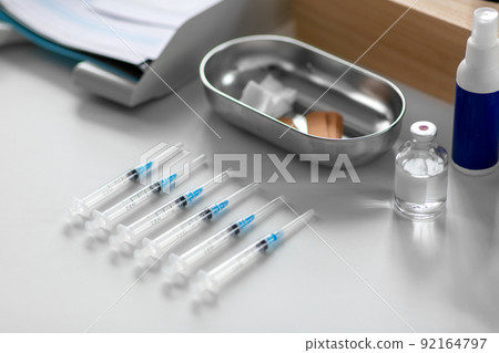 disposable syringes on table at hospital disposable syringes on table at hospital 92164797