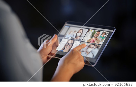 close up of woman tablet pc having video call close up of woman tablet pc having video call 92165652