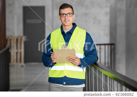 male architect with clipboard at office male architect with clipboard at office 92166002