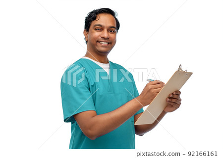 male doctor writing medical report on clipboard male doctor writing medical report on clipboard 92166161