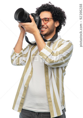 smiling man or photographer with digital camera smiling man or photographer with digital camera 92166288