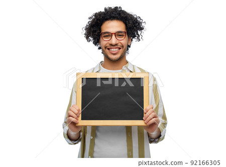 smiling man with chalkboard over white background smiling man with chalkboard over white background 92166305