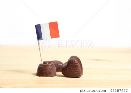 French Chocolate Truffles With French Flag on Table With White Background French Chocolate Truffles With French Flag on Table With White Background 92167422