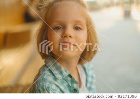 Portrait of cute boy looking at camera and smile Portrait of cute boy looking at camera and smile 92171390