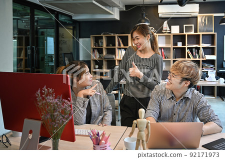 Team of coders planning, brainstorming ideas for new project at creative office 92171973