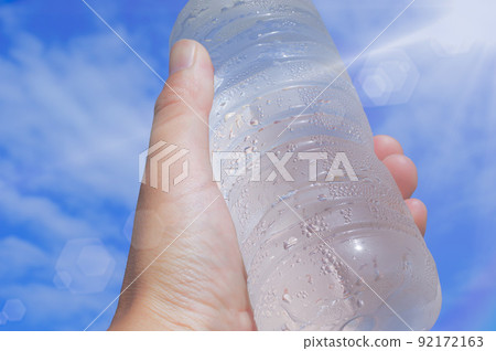 Cold PET bottle water and blue sky Cold PET bottle water and blue sky 92172163