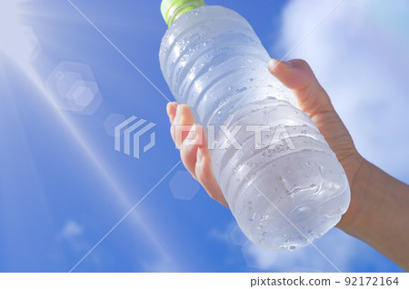 Cold PET bottle water and blue sky Cold PET bottle water and blue sky 92172164