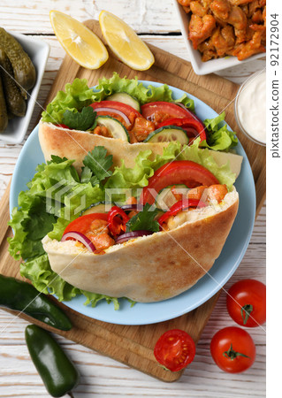 Concept of tasty food with pitas with chicken, top view 92172904