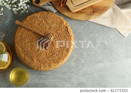 Concept of tasty dessert with honey cake, space for text 92173305