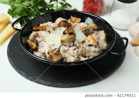 Concept of tasty food with risotto with mushrooms, close up Concept of tasty food with risotto with mushrooms, close up 92174021