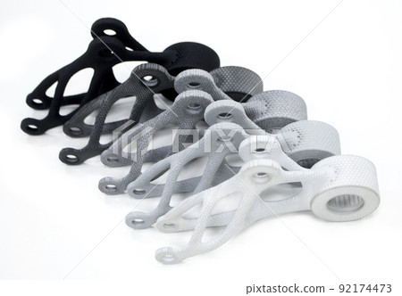 Models printed on 3D printer isolated on white background. Object details printed on 3D printer from plastic close-up. Prototype of shape made by 3d printer. Concept new modern printing technology 92174473