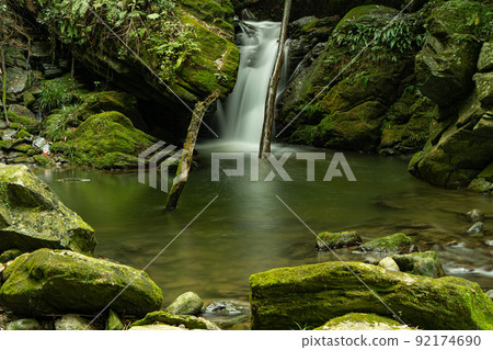 Yakushi no Taki in the clear river 92174690