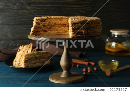 Concept of tasty dessert with honey cake, close up 92175237