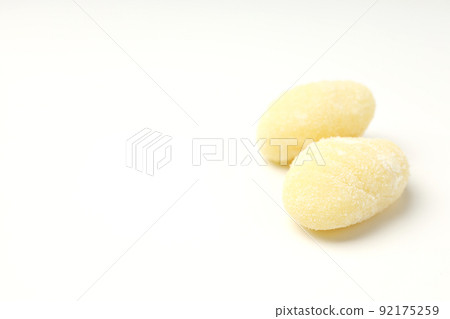 Raw potato gnocchi on white background, space for text Raw potato gnocchi on white background, space for text 92175259