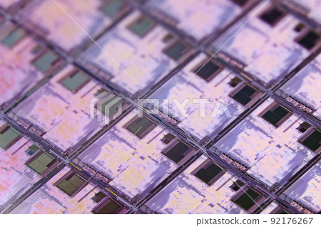 Silicon wafer with microchips used in electronics for the fabrication of integrated circuits. Full-frame high-tech macro background. 92176267