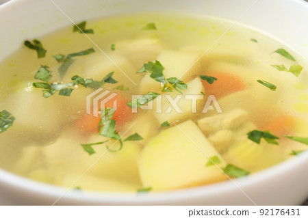 Plate of tasty chicken soup, close up Plate of tasty chicken soup, close up 92176431