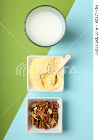 Concept of sports nutrition on two tone background Concept of sports nutrition on two tone background 92177768