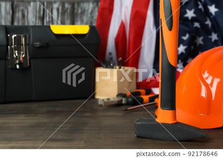Concept of Labor day on wooden table Concept of Labor day on wooden table 92178646