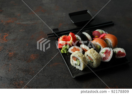 Concept of tasty food with sushi rolls, space for text 92178809