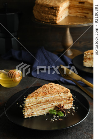 Concept of tasty dessert with honey cake, selective focus 92180891