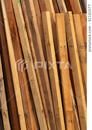 Background material of lumber leaning against the wall 92182077