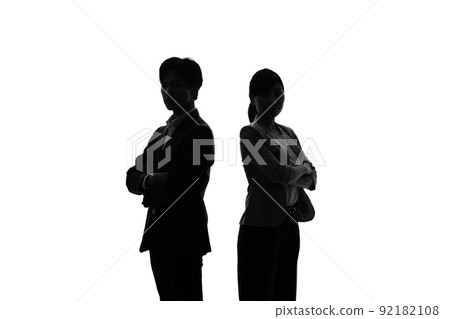 Silhouettes of men and women lined up 92182108