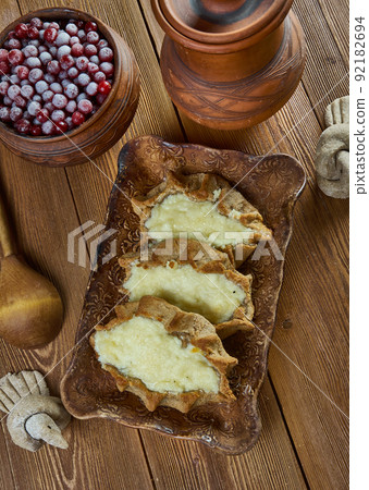Karelian pasty with potatoes Karelian pasty with potatoes 92182694