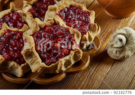 Karelian pasty with berries 92182776