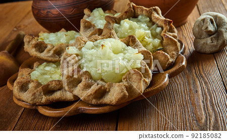 Karelian pasty with apples Karelian pasty with apples 92185082