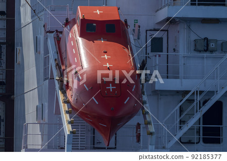 tanker container cargo ship red lifeboat vessel detail close up tanker container cargo ship red lifeboat vessel detail close up 92185377