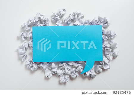 Paper Wraps Placed Under Speech Bubble With Important Information. Wrinkled Notes Arranged Underneath Dialogue Ballon With New Idea. Crumpled Memos With Critical Data Above 92185476