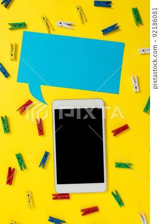 Pegs Placed Around Tablet And Speech Bubble With Important Informations. Colorful Pins Arranged All Over Dialogue Balloon And Phone Screen With Crutial Announcements. Pegs Placed Around Tablet And Speech Bubble With Important Informations. Colorful Pins Arranged All Over Dialogue Balloon And Phone Screen With Crutial Announcements. 92186081