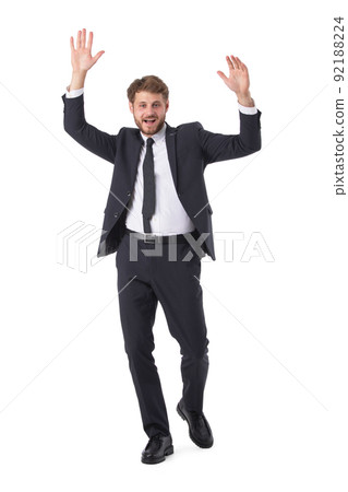 Business man hands up winner Business man hands up winner 92188224