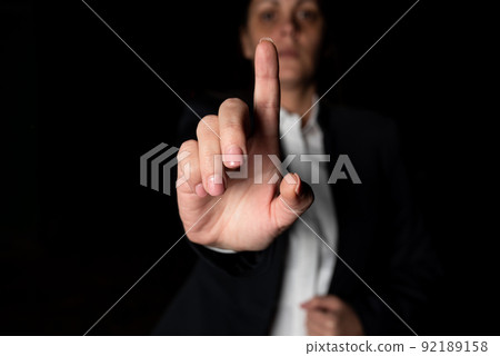 Businesswoman Pointing Important Infortmations With One Finger. Hand Presenting Crutial Announcement. Woman Showing Recent Updates. Executive Displaying Critical Messages. Businesswoman Pointing Important Infortmations With One Finger. Hand Presenting Crutial Announcement. Woman Showing Recent Updates. Executive Displaying Critical Messages. 92189158