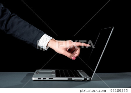 Businesswoman Pointing Important Message On Lap Top Screen. Woman Showing Crutial Information On Computer. Lady In Suit Presenting Recent Announcements. Businesswoman Pointing Important Message On Lap Top Screen. Woman Showing Crutial Information On Computer. Lady In Suit Presenting Recent Announcements. 92189355