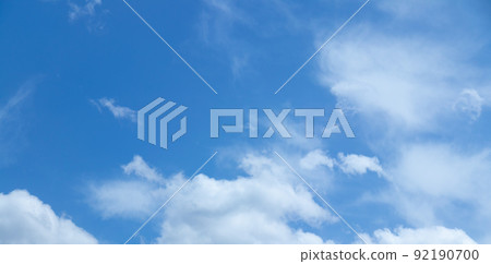 amazing blue background with light clouds  92190700