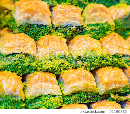Town made of pistachio baklava close up 92190883