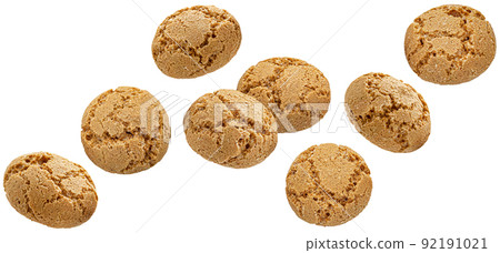 Falling italian amaretti, almond cookies isolated Falling italian amaretti, almond cookies isolated 92191021