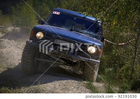 Off-road vehicle  overcomes the track 92191030