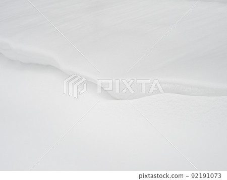 Snow drifts background, a large amount of fallen snow. White clean snow texture. Snow drifts background, a large amount of fallen snow. White clean snow texture. 92191073
