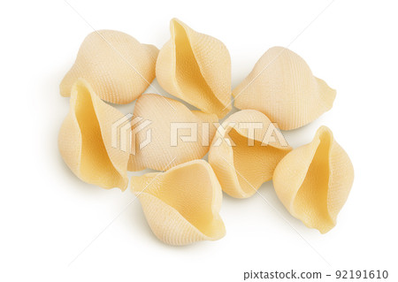 Conchiglioni italian pasta isolated on white background. Top view. Flat lay Conchiglioni italian pasta isolated on white background. Top view. Flat lay 92191610