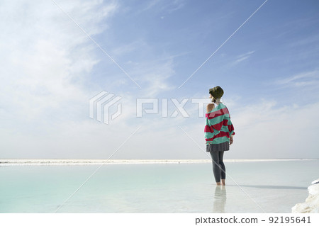 asian female tourist standing in water of a salt lake 92195641
