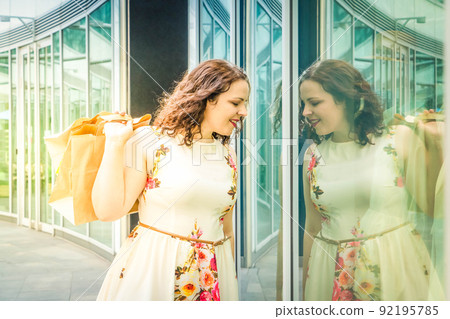 Happy woman shopping Happy woman shopping 92195785