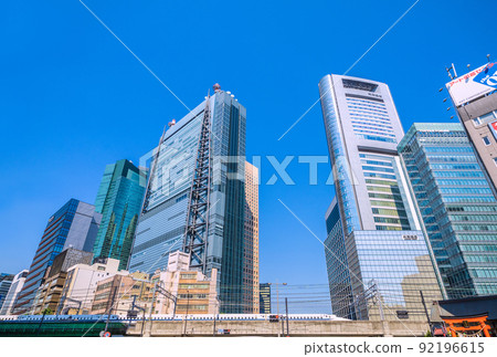 View of Shiodome offices and Shinkansen from the intersection of Higashi-Shimbashi 1-chome, Tokyo cityscape of Japan = July 1st View of Shiodome offices and Shinkansen from the intersection of Higashi-Shimbashi 1-chome, Tokyo cityscape of Japan = July 1st 92196615