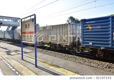 Taking a picture of the freight train at Izumisawa Station on the Isaribi Railway in Kikonai Town, Hokkaido in the summer Taking a picture of the freight train at Izumisawa Station on the Isaribi Railway in Kikonai Town, Hokkaido in the summer 92197183